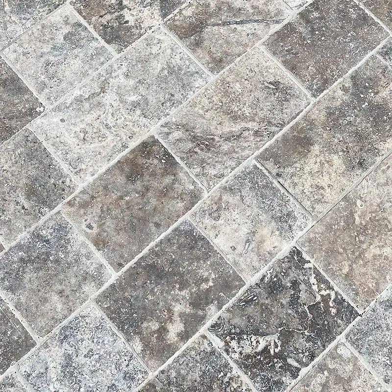 Pavés travertin gris avec du joint blanc
